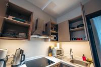 A kitchen or kitchenette at Kuledibi Suites, Historical 1-bedroom apartment No-2