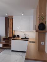 Kuchyň nebo kuchyňský kout v ubytování Villa Vitosha Apartments
