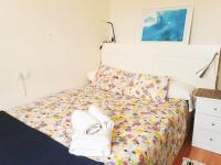 A bed or beds in a room at Casa Vista