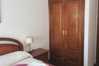 Postel nebo postele na pokoji v ubytování Charming Apartment in El Grove, Sea View