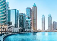 a large body of water in a city with tall buildings at Canal Central Hotel Business Bay in Dubai