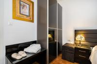 Postel nebo postele na pokoji v ubytování Apartment Suite Theater
