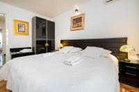 Postel nebo postele na pokoji v ubytování Apartment Suite Theater