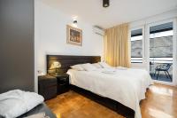 Postel nebo postele na pokoji v ubytování Apartment Suite Theater