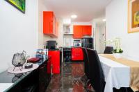 Kuchyň nebo kuchyňský kout v ubytování Apartment Suite Theater