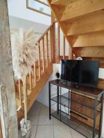 Telewizja i/lub zestaw kina domowego w obiekcie La Ferme de Frévan