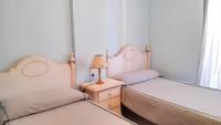 Posteľ alebo postele v izbe v ubytovaní Spacious apartment in Calpe of 100 m² with shared pool!