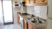 Kuchyňa alebo kuchynka v ubytovaní Spacious apartment in Calpe of 100 m² with shared pool!