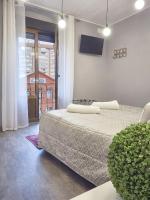 Posteľ alebo postele v izbe v ubytovaní Comfortable apartment in León - 55 m² + Balcony