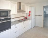 A kitchen or kitchenette at Spacious Apartment with Sea View in Estepona - 140 m²