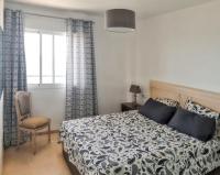 A bed or beds in a room at Spacious Apartment with Sea View in Estepona - 140 m²