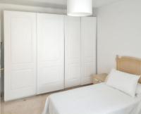 A bed or beds in a room at Spacious Apartment with Sea View in Estepona - 140 m²