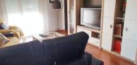 A television and/or entertainment centre at Spacious apartment with mountain view in Tabernas, 99 sqm