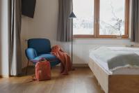Postel nebo postele na pokoji v ubytování biYou Ecoquartier in den Bergen