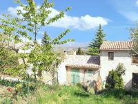 Vonkajšia záhrada v ubytovaní Maison de charme à Vachères avec jardin et vue montagne