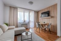 TV a/nebo společenská místnost v ubytování Pirin Sense Family Apt - Mountain View - SPA - FREE Parking