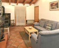 Posezení v ubytování Modern Apartment in Tolva with Garden and Sports Facilities