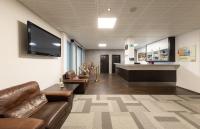 Telewizja i/lub zestaw kina domowego w obiekcie BNC Hotel - Restaurant - Bowling