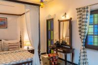 Indulge Udaipur by Packにあるベッド