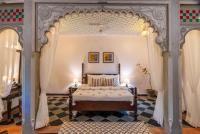 Indulge Udaipur by Packにあるベッド