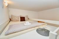 Postel nebo postele na pokoji v ubytování Apartmány Třeboň BÍLÝ BERÁNEK