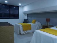 Postel nebo postele na pokoji v ubytování Room in Condo - Malecon Cozy - Premium Plus 19