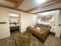A bed or beds in a room at Chalet Badberg