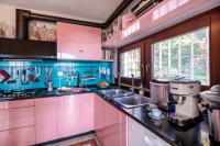 A kitchen or kitchenette at Villa Isidoro ampio parco ,piscina privata, arte e giochi , fitness