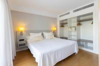 Cama o camas de una habitación en Hipotels Apartamentos Cala Bona
