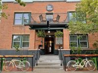two bikes parked in front of a building at Leland House Suites of Durango in Durango