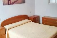 Postel nebo postele na pokoji v ubytování Welcoming Apartment in A Coruña, 90 m², Balcony