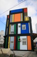 a building painted like a lego house at The Beauty of Basalt B&amp;B in Magong