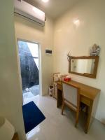 Postel nebo postele na pokoji v ubytování Maavaharu Guest House Himmafushi
