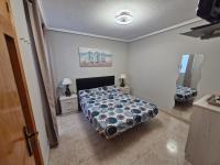 Posteľ alebo postele v izbe v ubytovaní Appartement a louer a Torrevieja 100m de la plage