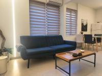 A seating area at Apollonas Downtown - 1BR Lux Apartment - Tsimiski Ladadika - Explore Center by foot - Close to Aristotelous square