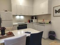 A kitchen or kitchenette at Apollonas Downtown - 1BR Lux Apartment - Tsimiski Ladadika - Explore Center by foot - Close to Aristotelous square