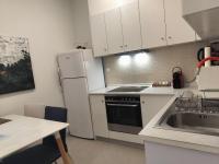 A kitchen or kitchenette at Apollonas Downtown - 1BR Lux Apartment - Tsimiski Ladadika - Explore Center by foot - Close to Aristotelous square
