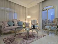 Posezení v ubytování Garden View Royal Villa 284 - 210 meters space,17 min to Airport 1 min to Water Way, New Cairo - El Banafseg