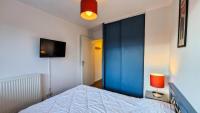 Łóżko lub łóżka w pokoju w obiekcie Résidence Les Pleiades - Appartement rénové · Centre station · Balcon · Parking couvert MAE-8234