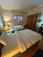 Postel nebo postele na pokoji v ubytování Royal Nile view 2BR