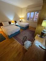 Postel nebo postele na pokoji v ubytování Royal Nile view 2BR