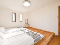 石垣島 villa 7716にあるベッド