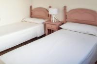 Postel nebo postele na pokoji v ubytování Cozy apartment in Santiago del Teide 70 m² mountain view