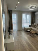 TV a/nebo společenská místnost v ubytování Villa Vitosha Apartments