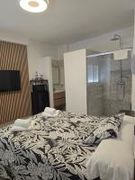 Posteľ alebo postele v izbe v ubytovaní Apartamentos Casa Sardina