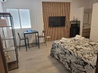 Posteľ alebo postele v izbe v ubytovaní Apartamentos Casa Sardina