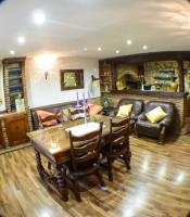 Posedenie v ubytovaní Green Peaks B&B Country House Alojamiento Rural