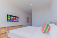 Beijing Watermelon Journey Hotel - Daxing Airportにあるベッド