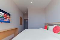 Beijing Watermelon Journey Hotel - Daxing Airportにあるベッド