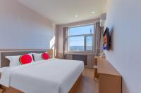 Beijing Watermelon Journey Hotel - Daxing Airportにあるテレビまたはエンターテインメントセンター